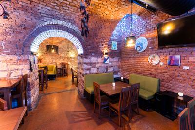Interior of the Prostor Elementů club – underground hall with original stone walls (15)